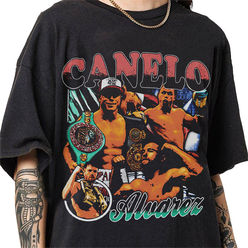 a man wearing a black shirt with a picture of two men on it