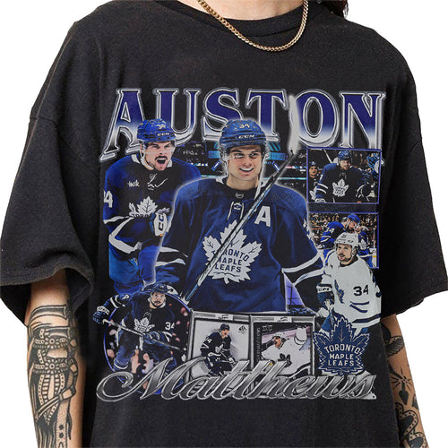a man wearing a black shirt with a picture of a hockey player on it