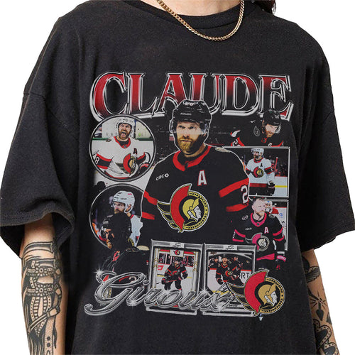 a man wearing a black shirt with pictures of hockey players on it