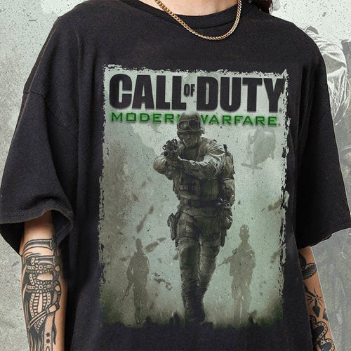 a man wearing a black shirt with a picture of a soldier on it